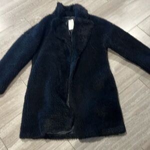 black fake fur coat  2snap closure ,slit pockets fully lined
